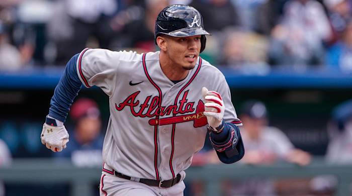 Atlanta Braves infielder Vaughn Grissom runs to first base after getting a hit during a game against the Kansas City Royals.